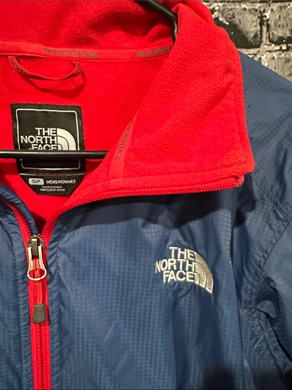 The North Face Blue Shell with Red Trim fleece lined Jacket